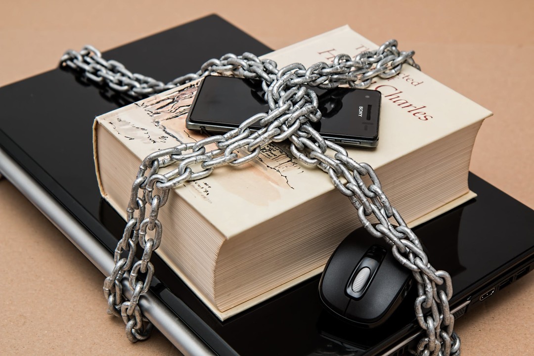 laptop wrapped in chains