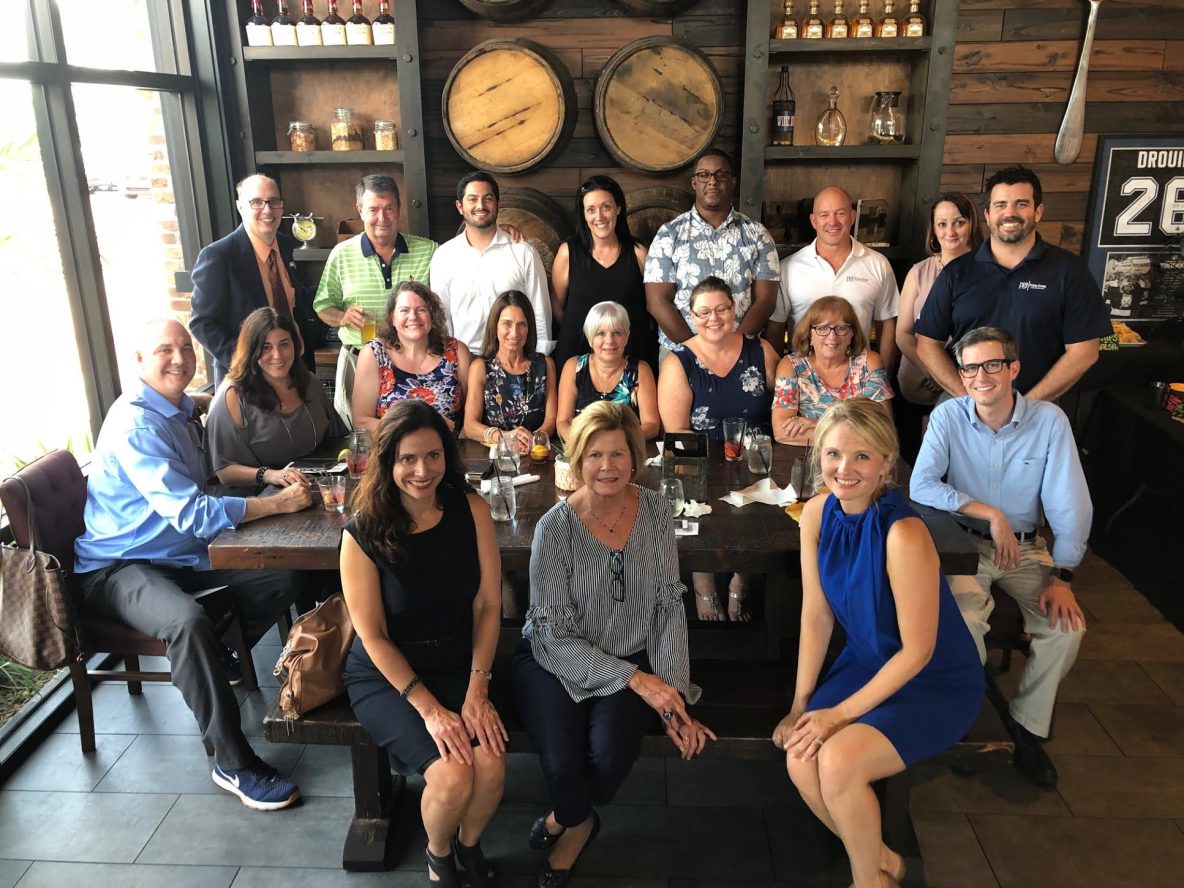 a group of people at a restaurant